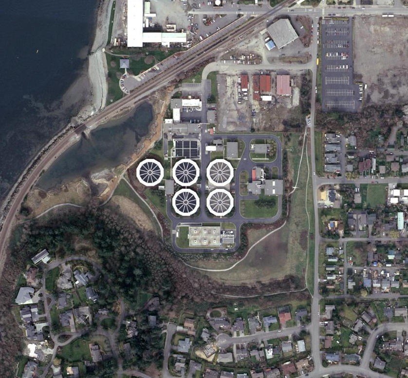 City aerial photo, 2008: Post Point with five round tanks